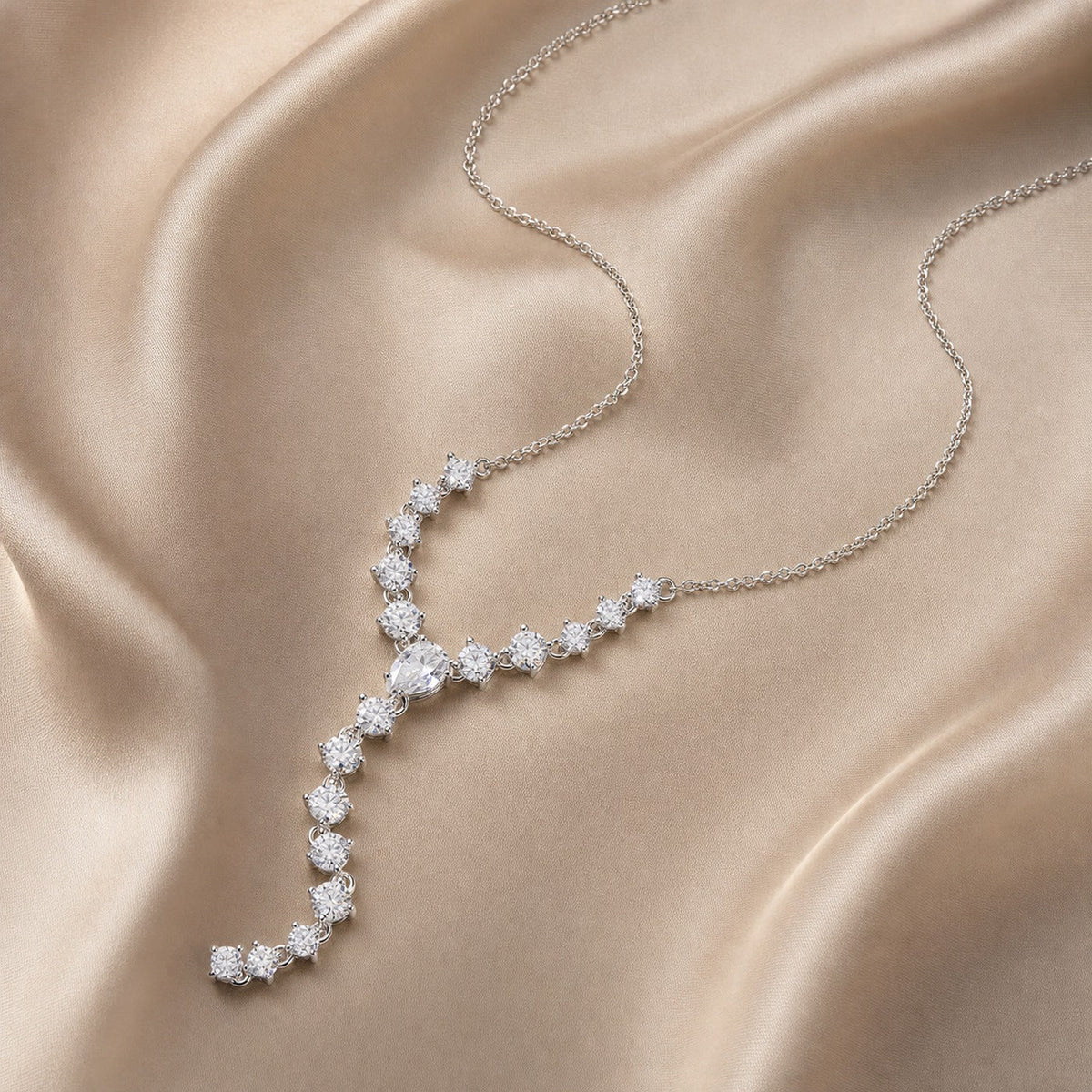 Y-Drop Lariat Necklace draped on satin